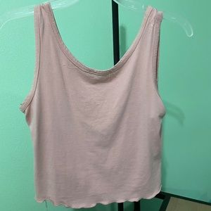 Baby pink cropped tank with frill at the bottom